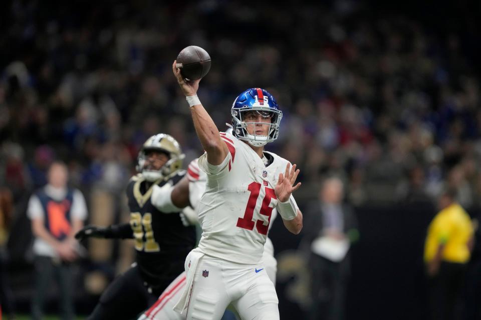 New York Giants quarterback Tommy DeVito (15) throws during the second half of an NFL football game against the New Orleans Saints Sunday, Dec. 17, 2023, in New Orleans. (AP Photo/Gerald Herbert)