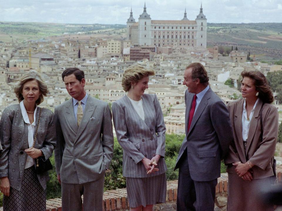 King Juan Carlos, second right, talks with Princess Diana, Princess of Wales, as Prince Charles, Prince of Wales, third left, talks with Queen Sofia during a visit to Toledo, Spain on April 24, 1987, on the last day of the semi-official visit of the British Royals to Spain.