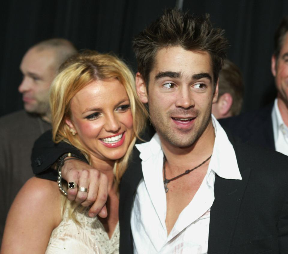 Colin Farrell with his arm around Britney Spears