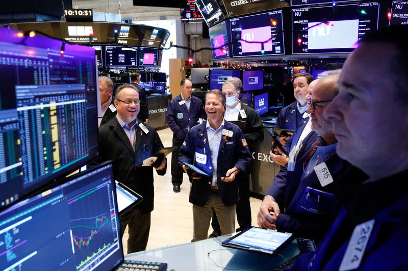 Traders work on the floor of the New York Stock Exchange in New York City,