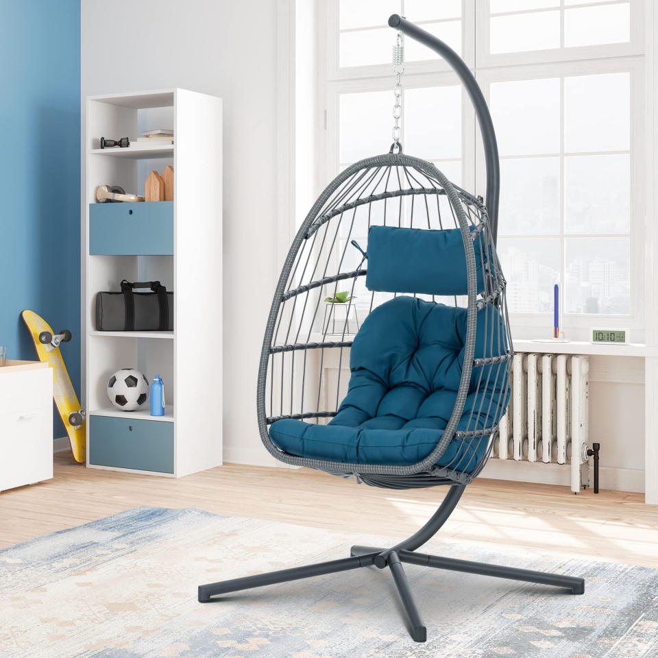 <p><a href="https://go.redirectingat.com?id=74968X1596630&url=https%3A%2F%2Fwww.walmart.com%2Fip%2FHanging-Egg-Chair-with-Steel-Stand-and-Fluffy-Cushion-Lounge-Wicker-Iron-Swing-Chairs-for-Indoor-Outdoor-Patio-Garden%2F802693181&sref=https%3A%2F%2Fwww.housebeautiful.com%2Fshopping%2Ffurniture%2Fg38984589%2Fbest-hanging-egg-chair%2F" rel="nofollow noopener" target="_blank" data-ylk="slk:Shop Now;elm:context_link;itc:0;sec:content-canvas" class="link ">Shop Now</a></p><p>Hanging Egg Chair with Steel Stand</p><p>walmart.com</p><p>$153.08</p>