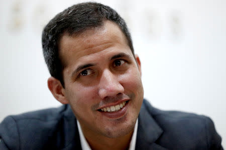 Venezuelan opposition leader Juan Guaido, who many nations have recognized as the country's rightful interim ruler, reacts during the meeting with public employees in Caracas, Venezuela March 5, 2019. REUTERS/Carlos Garcia Rawlins