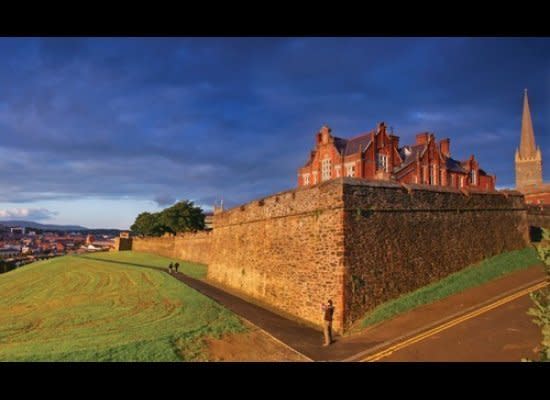 A <a href="http://www.derrycitytours.com/" target="_hplink">walking tour</a> above the walled city of Derry-Londonderry, in Northern Ireland, leads you literally atop the medieval wall and around the sites of political struggle and strife — both ancient, dating back 1,500 years, and recent, as evidenced by the striking murals and site of 1972’s Bloody Sunday massacre in the Bogside during The Troubles. In the Docklands area along Dublin’s River Liffey, you’ll find and be moved by <a href="http://www.ddda.ie/" target="_hplink">Famine</a>, a series of bronze sculptures dedicated to, and depicting, starving Irish forced to emigrate during the 19th century famine. Continue your walk through history by boarding the <a href="http://www.jeaniejohnston.ie/" target="_hplink">Jeanie Johnston</a>, a tall ship famine museum, docked nearby. For a more in-depth culture trip, <a href="http://lynotttours.com/i-tis.htm" target="_hplink">Lynott Tours</a>' six-night Irish Fling takes in a medieval-style dinner in Shannon, traditional music show in Cobh, a stroll along the historic streets of Kilkenny and free time to get under the skin of Dublin's local scene.