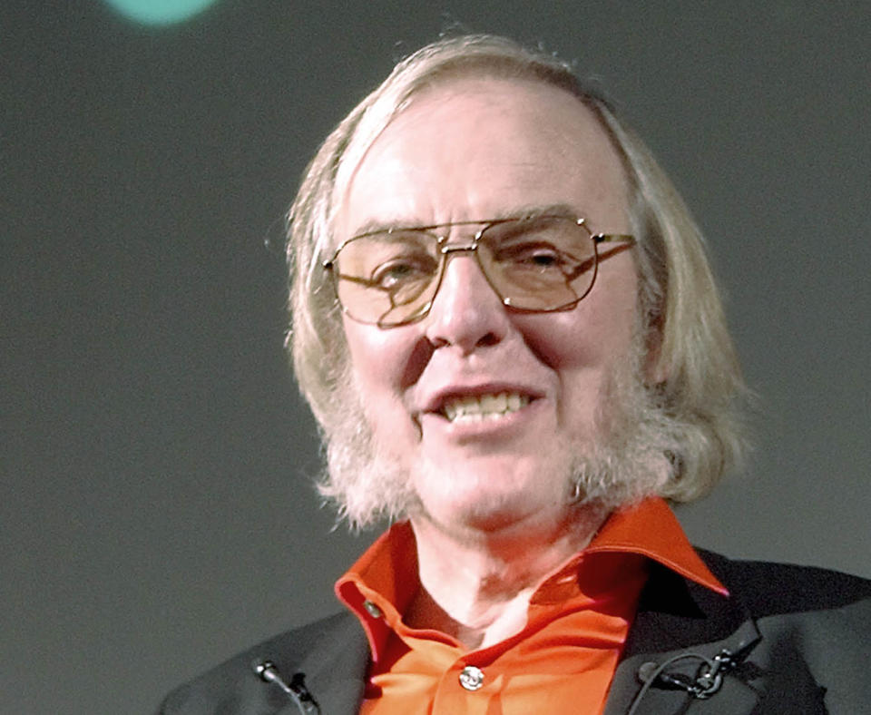 FILE - A Friday, Dec. 19, 2003 photo from files showing The Beagle2 spacecraft projects leading scientist Professor Colin Pillinger, in London. Pillinger, an ebullient British space scientist who captured the popular imagination with his failed attempt to land a probe on Mars, has died. He was 70. Pillinger's family said Thursday that he died at Addenbrooke's Hospital in Cambridge after suffering a brain hemorrhage while sitting in his garden in the university town. (AP Photo/Max Nash, File)