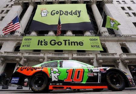A NASCAR vehicle is seen parked out front during web hosting company GoDaddy's initial public offering (IPO) at the New York Stock Exchange in this April 1, 2015 file photo. REUTERS/Brendan McDermid