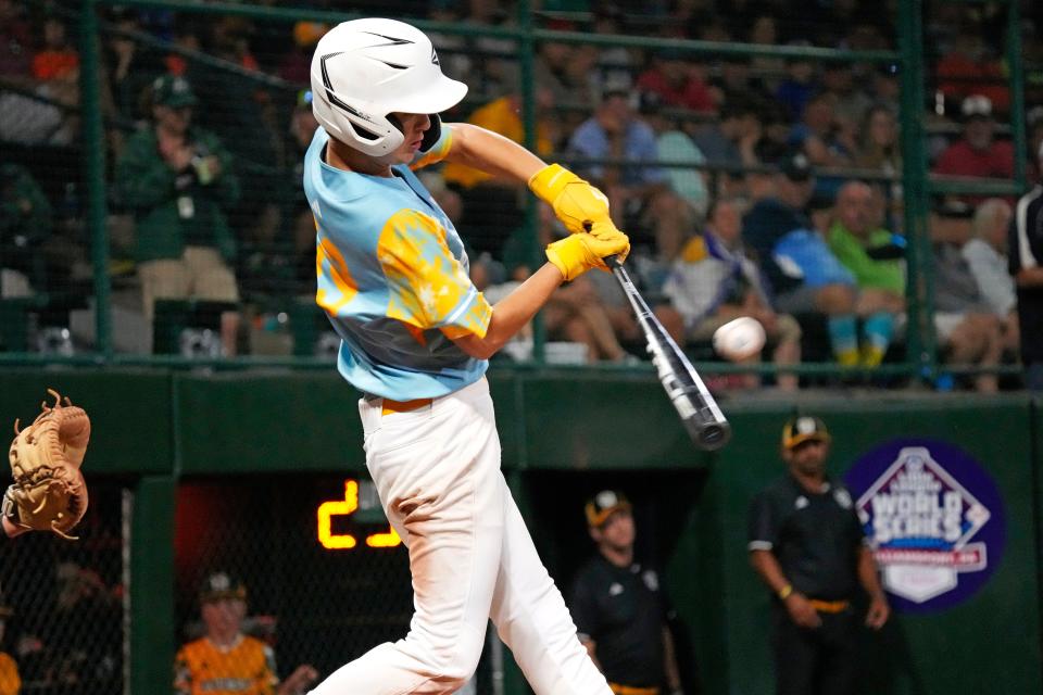 El Segundo, Calif.'s Louis Lappe hits a two-run home run off Nolensville, Tenn.'s Nash Carter during the fifth inning of a baseball game at the Little League World Series in South Williamsport, Pa., Wednesday, Aug. 23, 2023. California won 5-3. (AP Photo/Gene J. Puskar) ORG XMIT: PAGP325