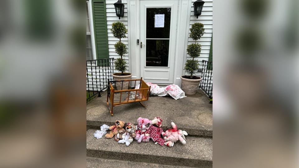 Student protesters leave bloodied stuffed animals outside a private residence