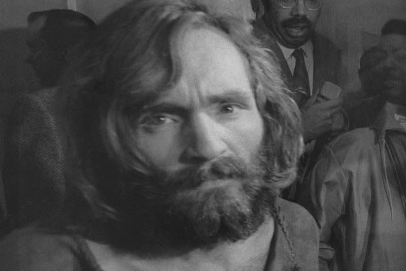 Charles Manson is taken into custody at the Los Angeles jail in 1969 after being charged, and later convicted, with the murders of actress Sharon Tate and her unborn child along with several of her friends. The murders took place on August 9, 1969. File Photo by Ernie Schwork/UPI