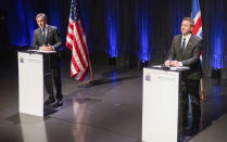 US Secretary of State Antony Blinken, left, speaks during a joint press conference following meetings with the Icelandic Foreign Minister Gudlaugur Thor Thordarson, at the Harpa Concert Hall in Reykjavik, Iceland, Tuesday, May 18, 2021. Blinken is touting the Biden administration's abrupt shift in its predecessor's climate policies as he visits Iceland for talks with senior officials from the world's Arctic nations. (Saul Loeb/Pool Photo via AP)