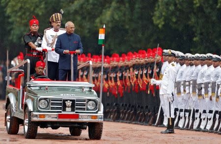 India's new President Ram Nath Kovind inspects an honour guard after being sworn in at the Rashtrapati Bhavan presidential palace in New Delhi, India July 25, 2017. REUTERS/Cathal McNaughton