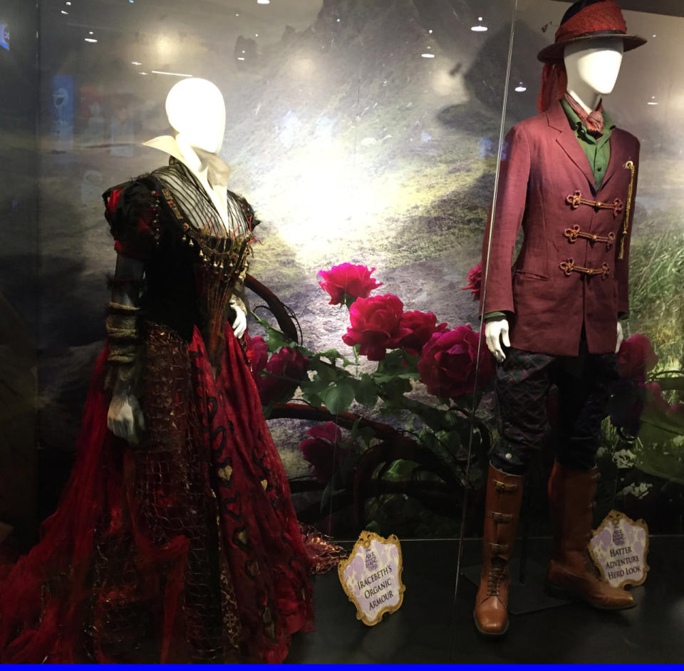 Helena Bonham Carter’s Red Queen, called Iracebeth in the time-hopping sequel, wears the rose-inspired “organic armour” on the left; Depp’s Hatter has an almost Capt. Jack-esque scarf on his chapeau when he dons his “adventure hero look.”