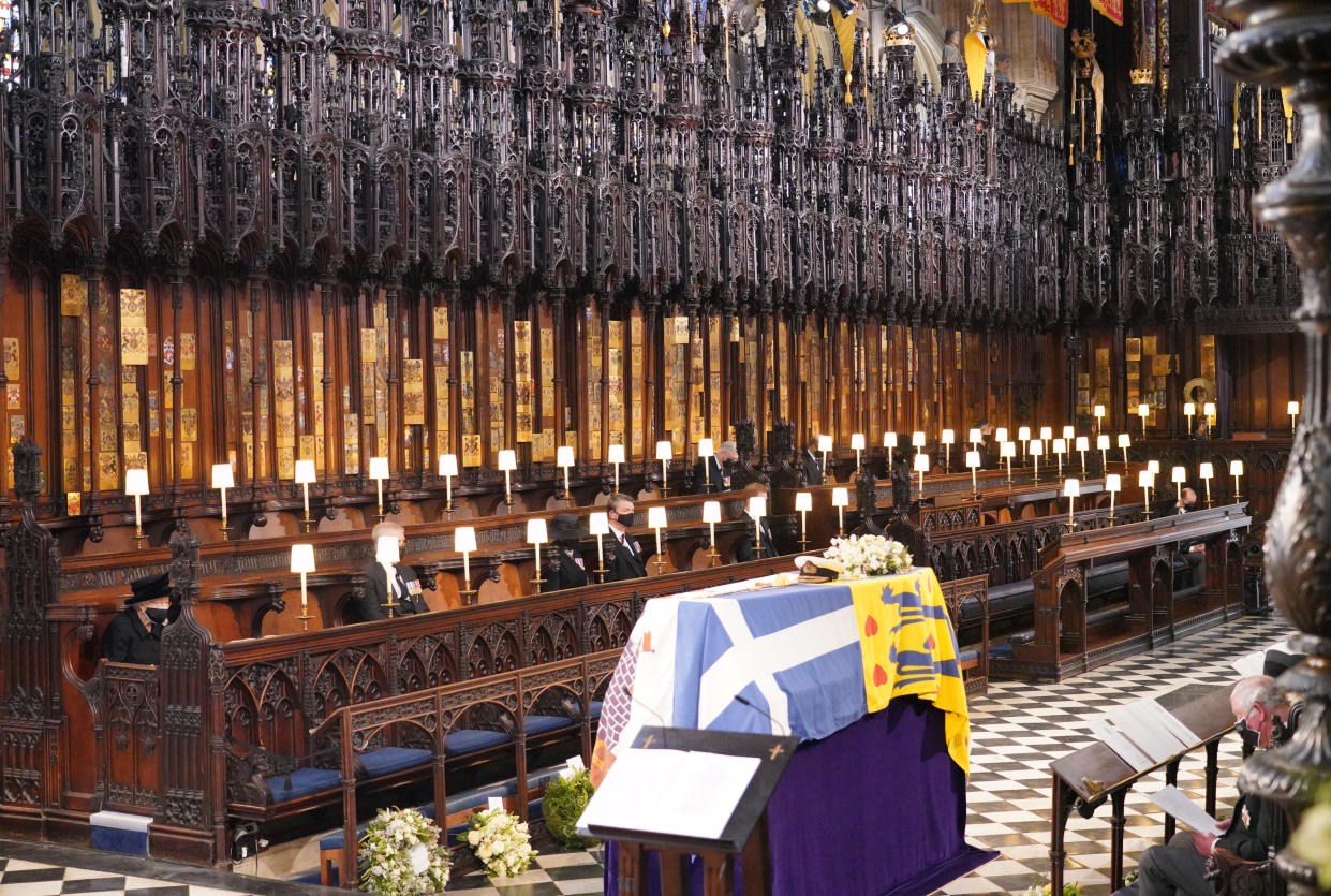 Queen Elizabeth II (left) and the Prince of Wales (right) during the funeral of the Duke of Edinburgh, at St George's Chapel, Windsor Castle, Berkshire. Picture date: Saturday April 17, 2021.