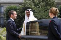 FILE - France's President Emmanuel Macron, left, shakes hand with Crown Prince of Abu Dhabi and Deputy Supreme Commander of the UAE Armed Forces Sheikh Mohammed bin Zayed al-Nahayan, prior to a meeting, at the Elysee Palace, in Paris, Wednesday, June 21, 2017. Still reeling from the recent submarine deal rapture by Western allies, French President Emmanuel Macron is visiting the energy-rich Arab countries of the Persian Gulf on Friday Dec. 3, 2021, with an aim to close a lucrative arms deal and strengthen France's leadership role in renewed international efforts to revive Iran's cratered nuclear deal with world powers. (AP Photo/Thibault Camus, File)