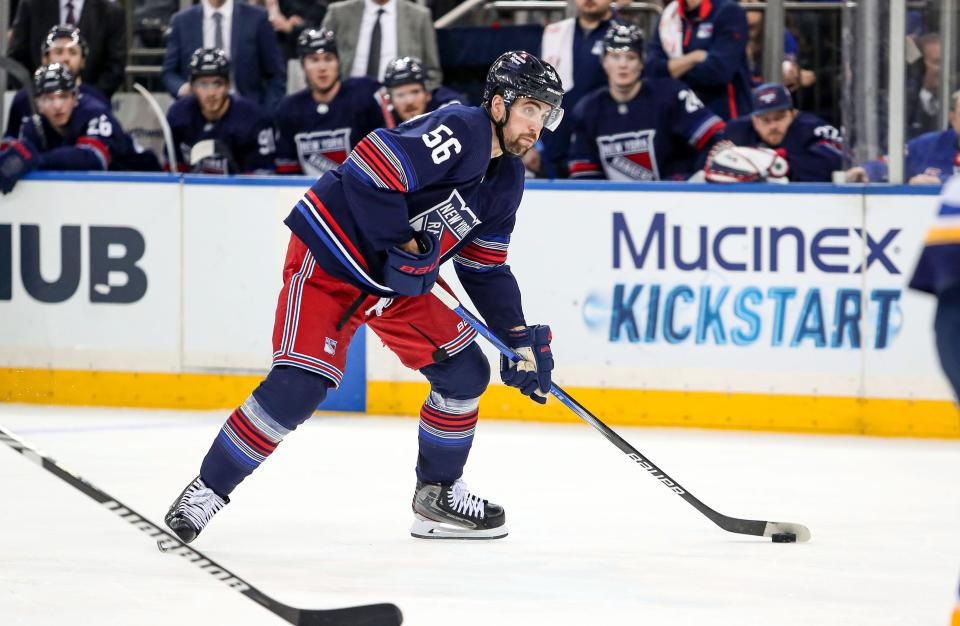 Mar 9, 2024; New York, New York, USA; New York Rangers defenseman Erik Gustafsson (56) takes a shot against the St. Louis Blues during the second period at Madison Square Garden.