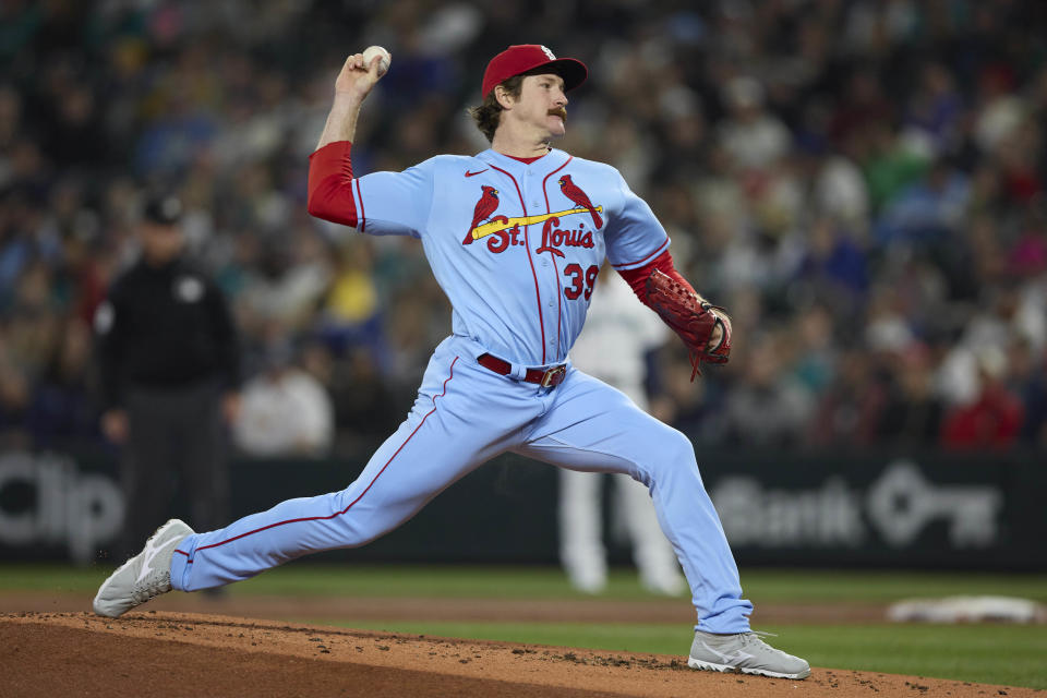 St. Louis Cardinals starting pitcher Miles Mikolas works against against the Seattle Mariners during the first inning of a baseball game Saturday, April 22, 2023, in Seattle. AP Photo/John Froschauer)