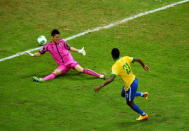 BRASILIA, BRAZIL - JUNE 15: Jo of Brazil scores his team's third goal past Eiji Kawashima of Japan during the FIFA Confederations Cup Brazil 2013 Group A match between Brazil and Japan at National Stadium on June 15, 2013 in Brasilia, Brazil. (Photo by Clive Mason/Getty Images)