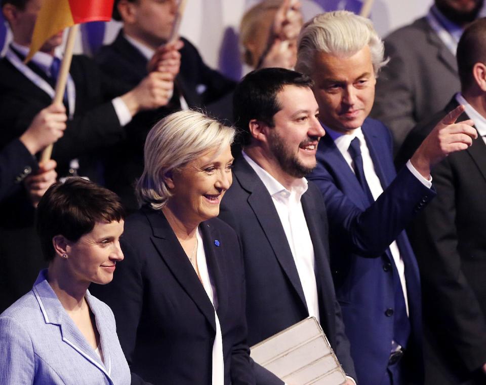 AfD (Alternative for Germany) chairwoman Frauke Petry, Far-right leader and candidate for next spring presidential elections Marine le Pen from France, Italian Lega Nord chief Matteo Salvini and Dutch populist anti-Islam lawmaker Geert Wilders , from left, stand together in the beginning of a meeting of European Nationalists in Koblenz, Germany, Saturday, Jan. 21, 2017. (AP Photo/Michael Probst)