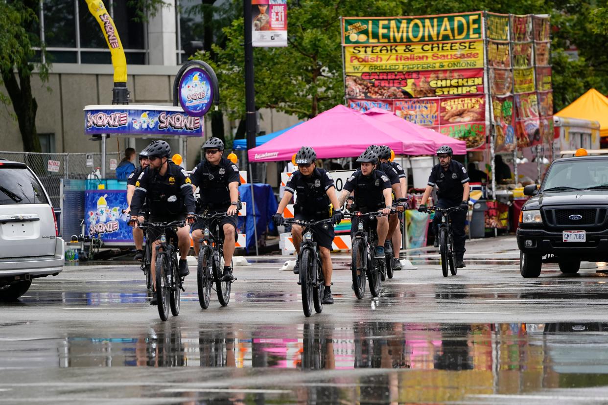 Columbus P\police officers on bikes patrol Downtown prior to Red, White & Boom.