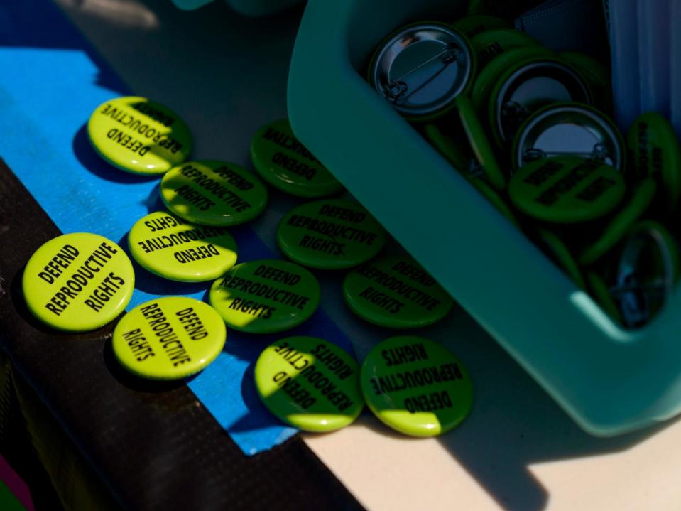 PHOTO: Buttons were available for attendees during the Teens 4 Reproductive Rights meeting at The Park at Harlinsdale Farm, in Franklin, Tenn., Aug. 13, 2022. (William DeShazer for The Washington Post via Getty Images)