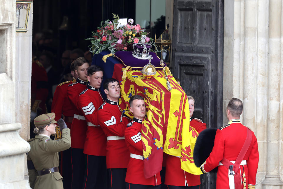 HM Queen Elizabeth's coffin is carried out of the doors of Westminster Abbey during The State Funeral Of Queen Elizabeth II at Westminster Abbey on September 19, 2022 in London, England. Elizabeth Alexandra Mary Windsor was born in Bruton Street, Mayfair, London on 21 April 1926. She married Prince Philip in 1947 and ascended the throne of the United Kingdom and Commonwealth on 6 February 1952 after the death of her Father, King George VI. Queen Elizabeth II died at Balmoral Castle in Scotland on September 8, 2022, and is succeeded by her eldest son, King Charles III. (Photo by Chris Jackson/Getty Images)