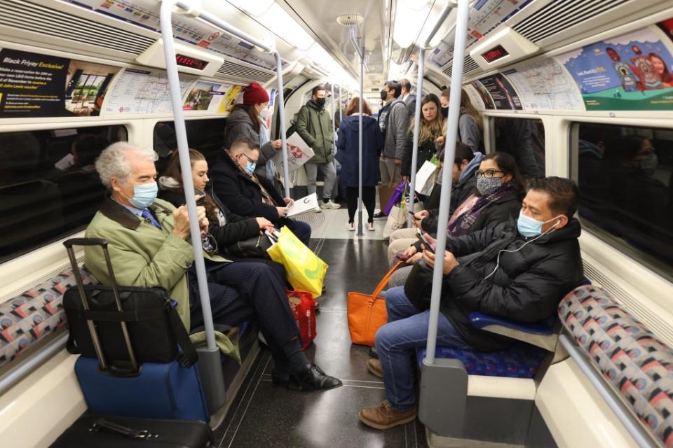 Passengers on Transport for London services will still be required to wear face coverings (James Manning/PA) (PA Wire)