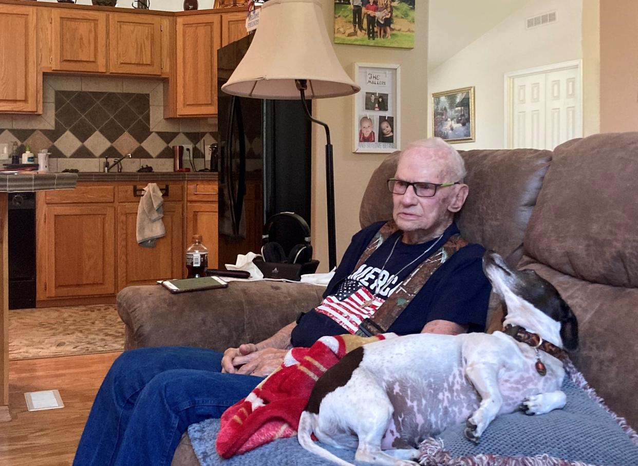 Sterling "Pete" Lambert of Redding and his dog Ron enjoyed their time together for a photo in 2020. Lambert, a World War II veteran, died Monday at the age of 102.