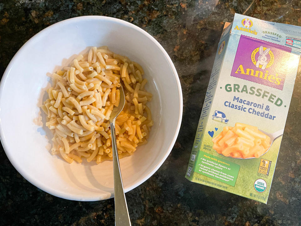 Cooked Annie's Grassfed mac 'n' cheese next to its packaging