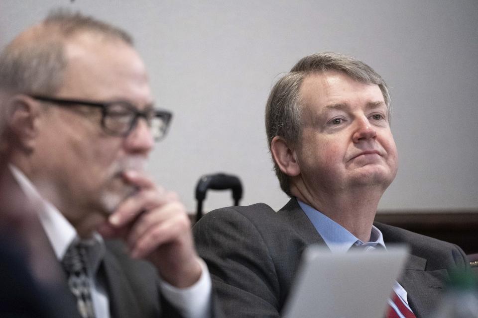 Defense attorney Kevin Gough listens to court proceedings during the trial for the killing of Ahmaud Arbery at the Glynn County Courthouse on Thursday, Nov. 18, 2021, in Brunswick, Ga. Greg McMichael, his son Travis McMichael, and neighbor William "Roddie" Bryan are charged with the February 2020 slaying of 25-year-old Ahmaud Arbery. (Sean Rayford/Pool Photo via AP)