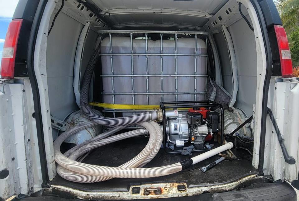 A pump is shown in the back of a van that Monroe County Sheriff’s Office deputies say two men used to steal about 300 gallons of cooking oil from a Florida Keys restaurant Tuesday, July 4, 2023. MCSO