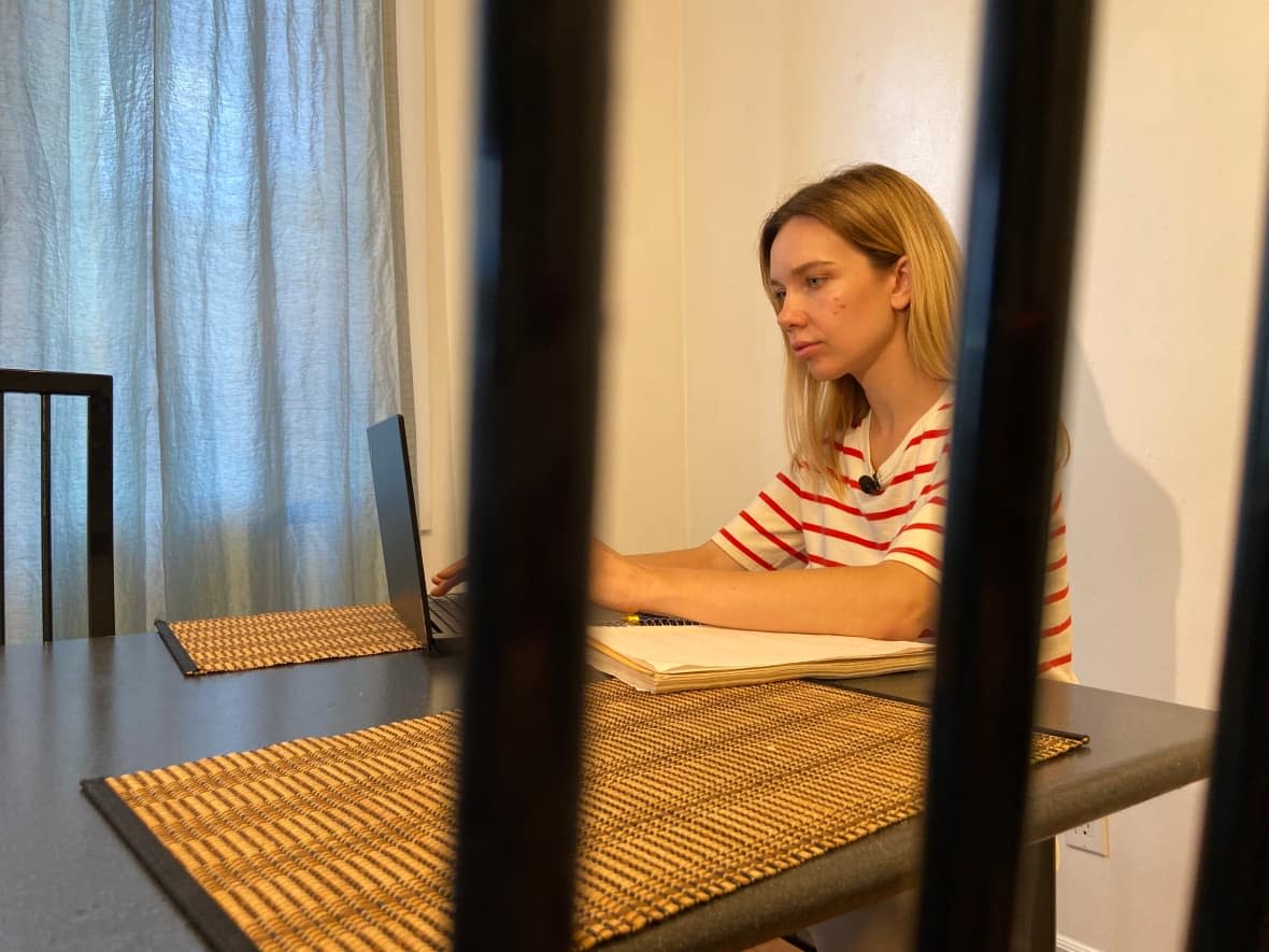 After fleeing Ukraine, Oleksandra Zhovtiuk chose to settle in Quebec due to the province's renowned subsidized daycare system. She never expected to be ineligible for the service.  (Rowan Kennedy/CBC News - image credit)