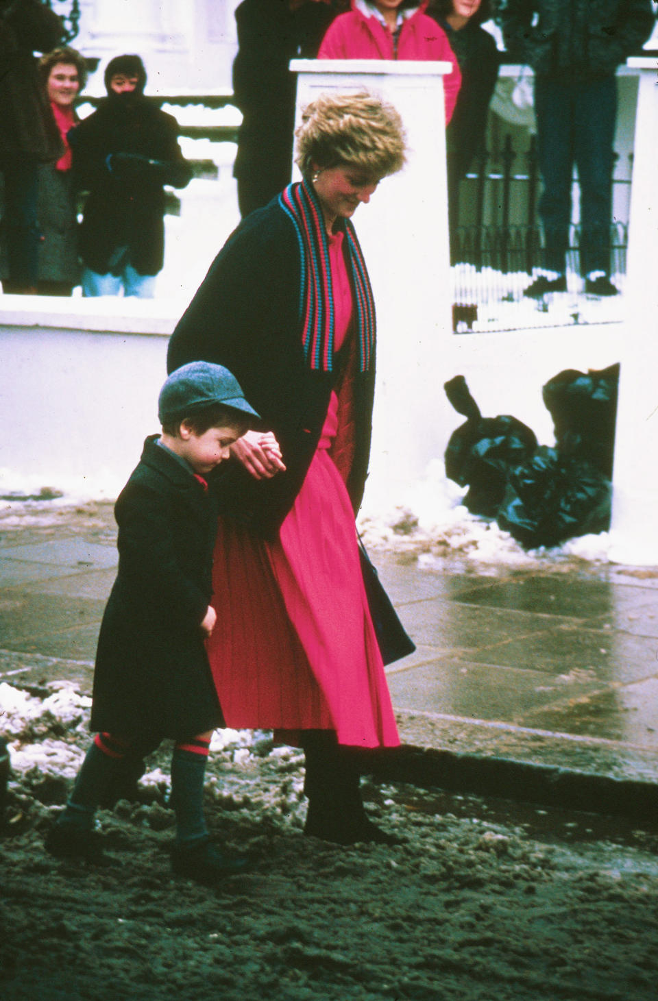 A beaming Diana walks William, then 5,  to his London school.