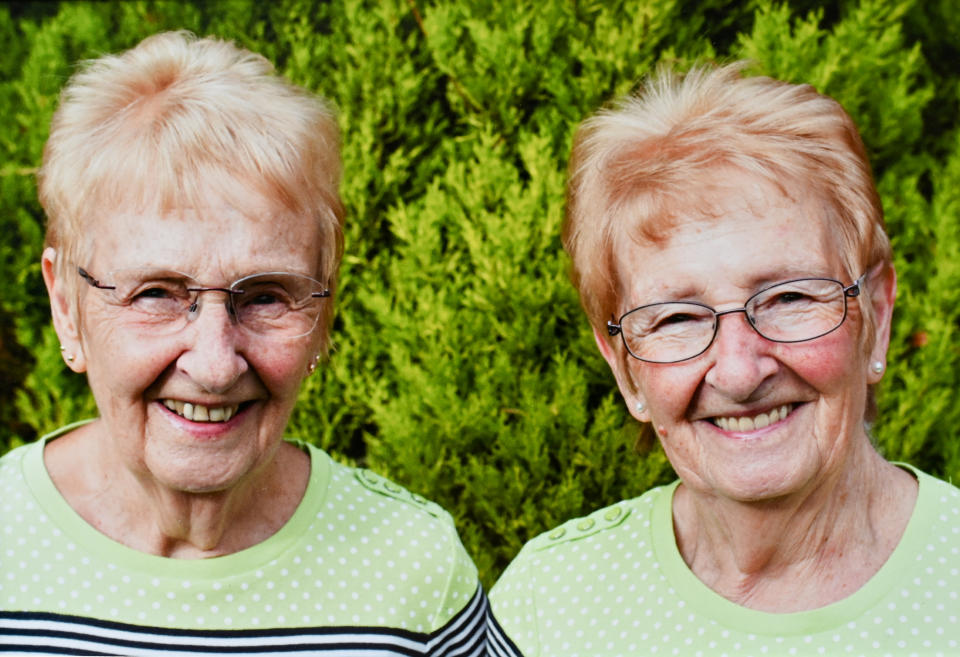 Maureen and Margaret (L-R) pictured on their 80th birthday in the garden at home. (SWNS)