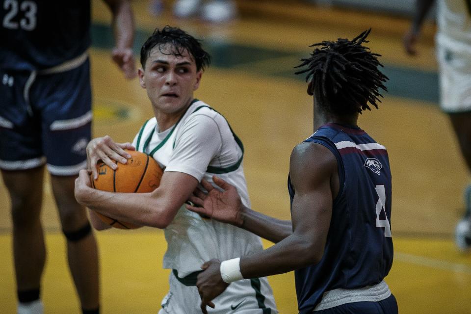 The Suncoast Community High School Chargers hosted the William T. Dwyer High School Panthers in boys high school basketball action in Riviera Beach, Fla., on January 25, 2023. Dwyer won 46-45 over Suncoast.