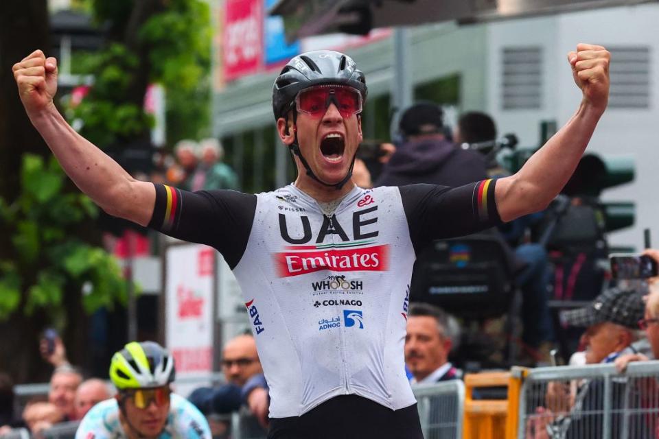 UAE Team Emiratess German rider Pascal Ackermann celebrates after he crossed the finish line to win the eleventh stage of the Giro dItalia 2023 cycling race 219 km between Camaiore and Tortona on May 17 2023 Photo by Luca Bettini  AFP Photo by LUCA BETTINIAFP via Getty Images