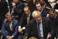 Britain's Prime Minister Boris Johnson speaks in the House of Commons in London following the debate for the EU Withdrawal Agreement Bill, Tuesday Oct. 22, 2019. British lawmakers have rejected the government’s fast-track attempt to pass its Brexit bill within days, demanding more time to scrutinize the complex legislation and throwing Prime Minister Boris Johnson’s exit timetable into chaos. (Jessica Taylor, UK Parliament via AP)