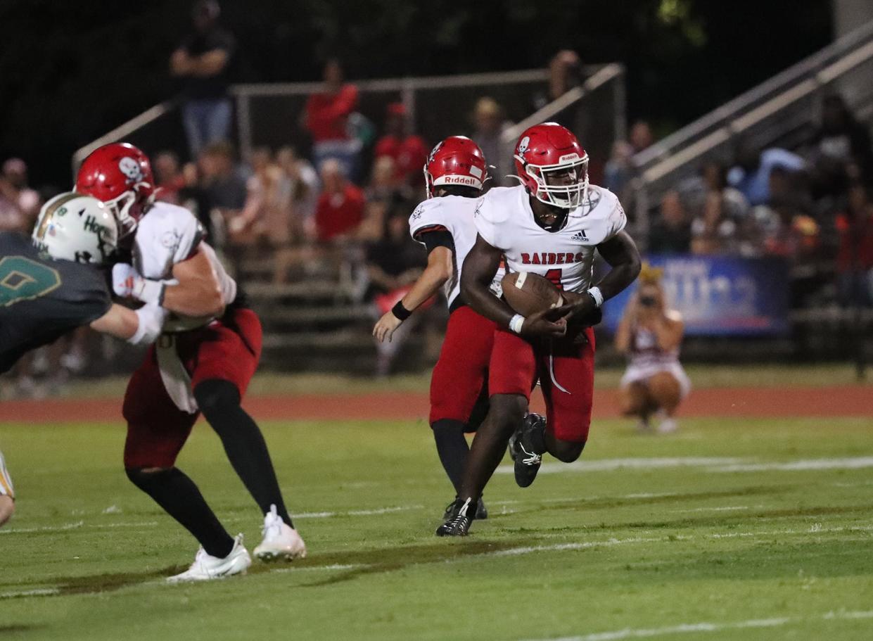 Savannah Christian's Zo Smalls looks for some running room against the Savannah Country Day defense during their game on Friday, September 15, 2023 at Savannah Country Day.