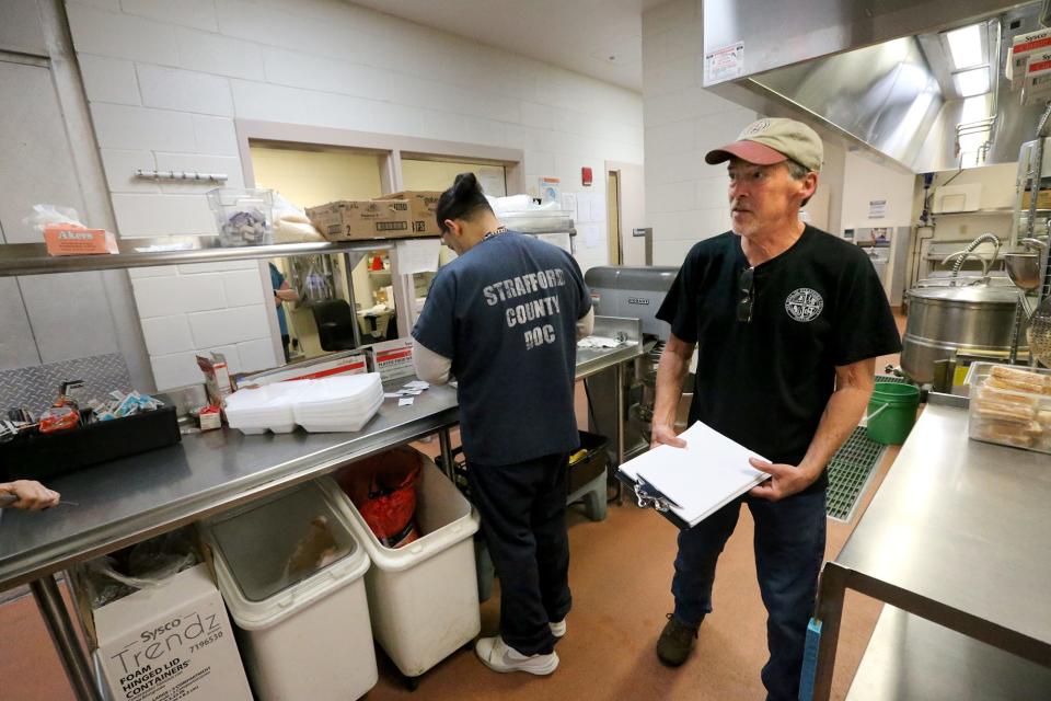 Strafford County Jail kitchen supervisor Paul Thorpe says inmates who work in the kitchen do a great job and are paid.