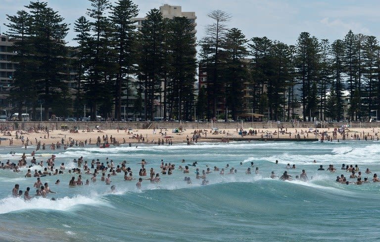 Sydney residents and tourists cool off in the sea at Manly beach in Sydney on January 8, 2013. Temperatures in Sydney hit their highest level on record on Friday, with the mercury in Australia's biggest city reaching 45.8 degrees Celsius in the mid-afternoon