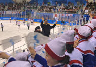Ice Hockey – Pyeongchang 2018 Winter Olympics – Women Preliminary Round Match - Korea v Japan - Kwandong Hockey Centre, Gangneung, South Korea – February 14, 2018. A North Korean leader Kim Jong-un lookalike waves in the stands. REUTERS/Staff