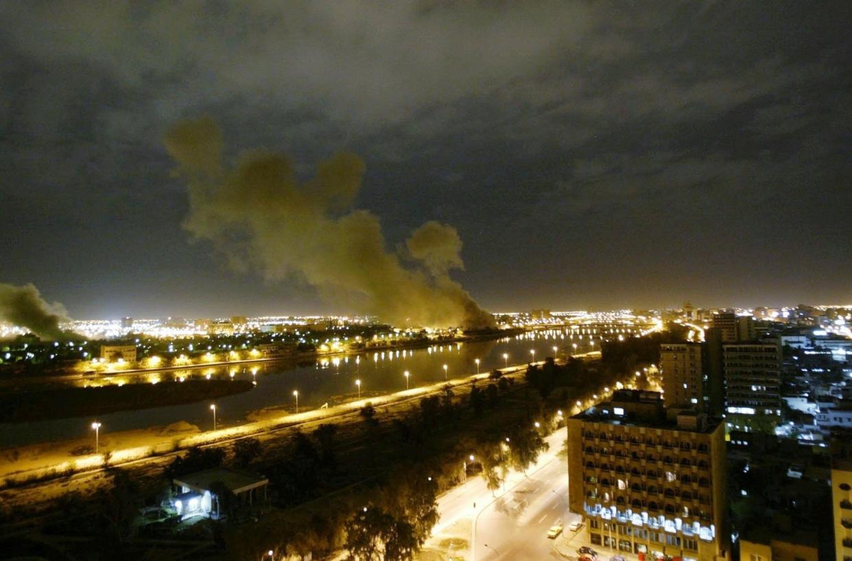 Smoke rises from the Trade Ministry in Baghdad on March 20, 2003, after it was hit by a missile during US-led attacks.