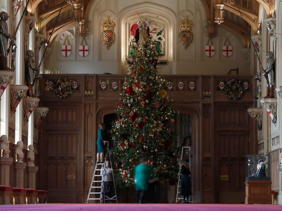 Decorating the Christmas tree in St. George's Hall.