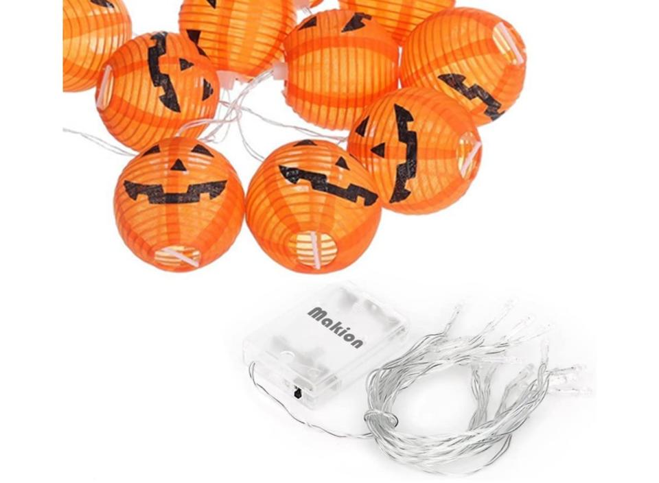 These fabric pumpkin lights are a long-lasting spin on the classic jack-o'-lantern. (Source: Amazon)