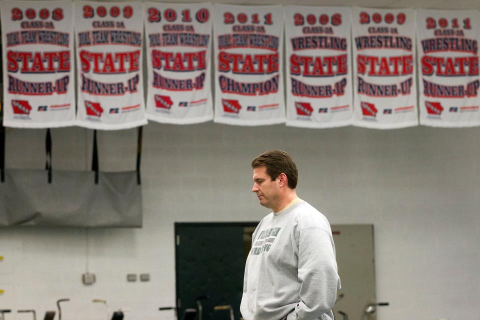 Mark Reiland led Iowa City West to seven state titles in 18 years.