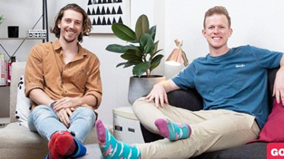 A photo of Gogglebox stars Symon Lovett and Adam Densten in their living room.