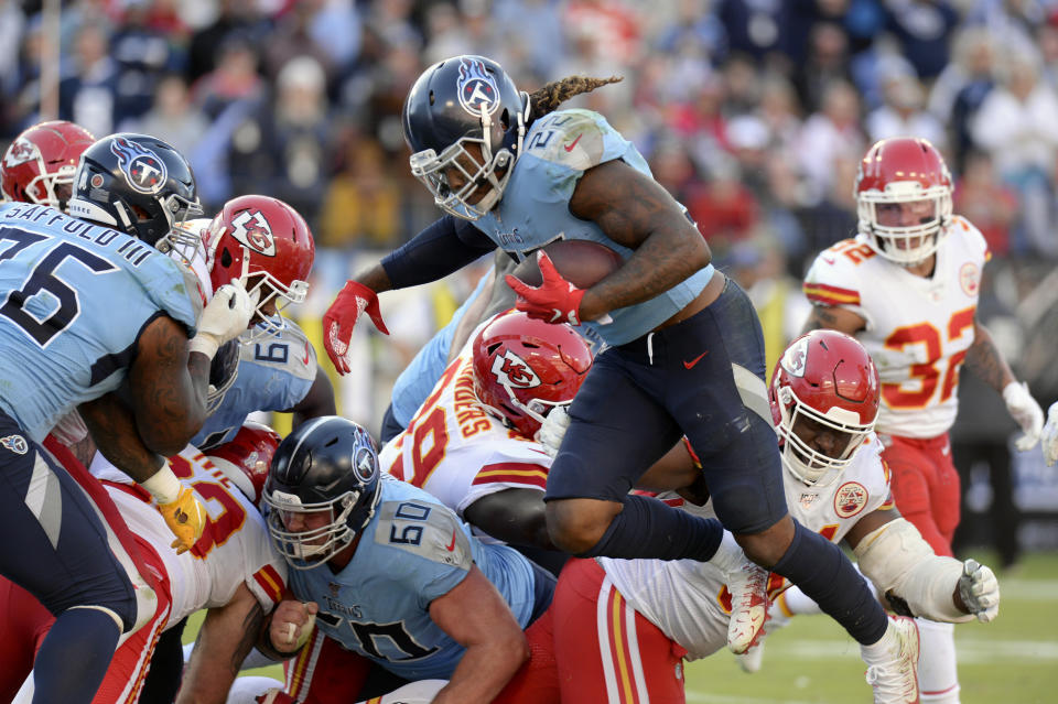 Tennessee Titans running back Derrick Henry (22) scores a touchdown on a 1-yard run against the Kansas City Chiefs in the second half of an NFL football game Sunday, Nov. 10, 2019, in Nashville, Tenn. (AP Photo/Mark Zaleski)