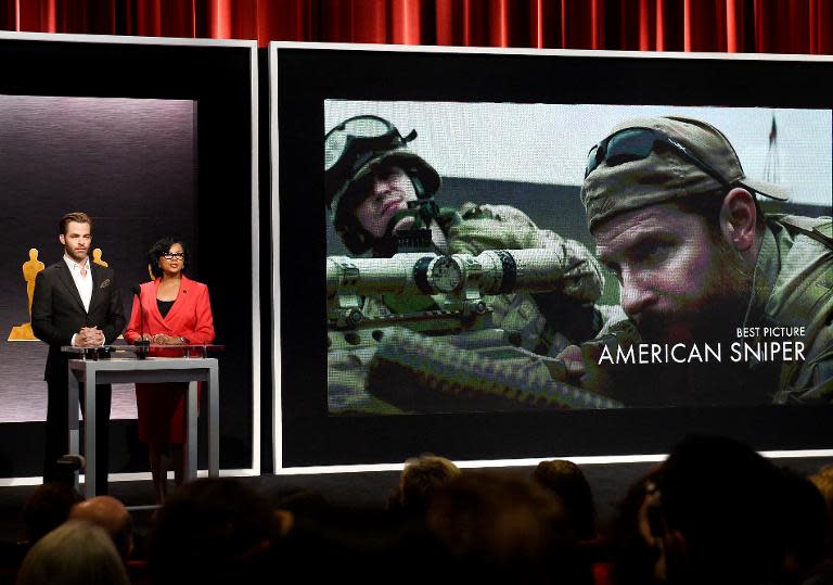 Chris Pine and Academy President Cheryl Boone announce the movie 'American Sniper' as one of the Oscar nominees for Best Picture at the Samuel Goldwyn Theater in Beverly Hills, California, January 15, 2015