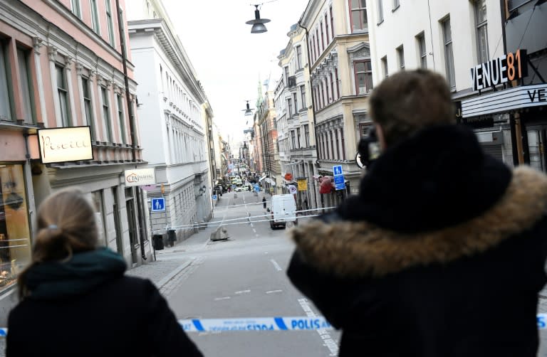 Four people were killed and 15 others injured when a stolen truck slammed into a crowd of people outside a busy department store in central Stockholm, in what the prime minister described as a "terror attack"