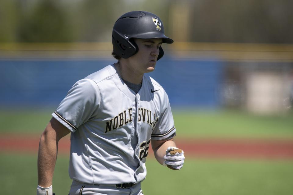 Noblesville High School junior Nolan Decker (22) during an IHSAA varsity baseball game against Carmel High School, Saturday, April 15, 2023, at Carmel High Schoolâ€™s Hartman Field.