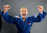 Kayla Harrison of the US Judo Olympic team poses for pictures during the 2012 Team USA Media Summit on May 13, 2012 in Dallas,Texas. JOE KLAMARJOE/AFP/GettyImages