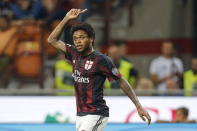 AC Milan's Luiz Adriano celebrates after scoring against Empoli during their Serie A soccer match at San Siro stadium in Milan, August 29, 2015. REUTERS/Giampiero Sposito